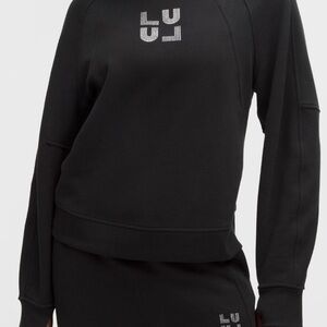 Lululemon NWT black jeweled logo scuba size M/L. Brand new never worn